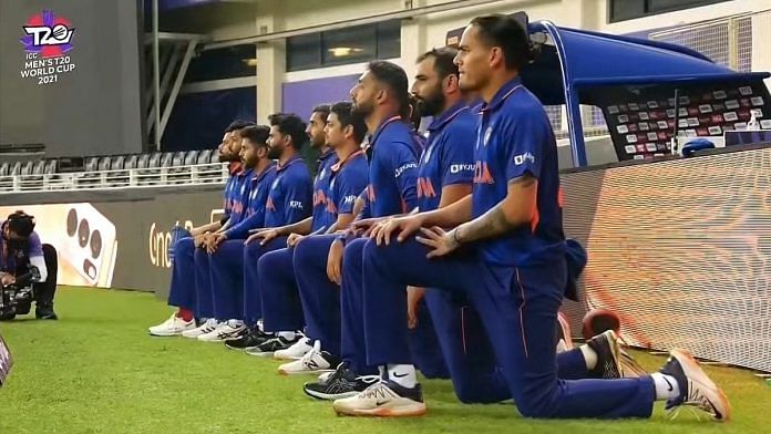 The Indian cricket team took the knee ahead of its T20 World Cup match against Pakistan on 24 October 2021 in Dubai. | Photo: Twitter