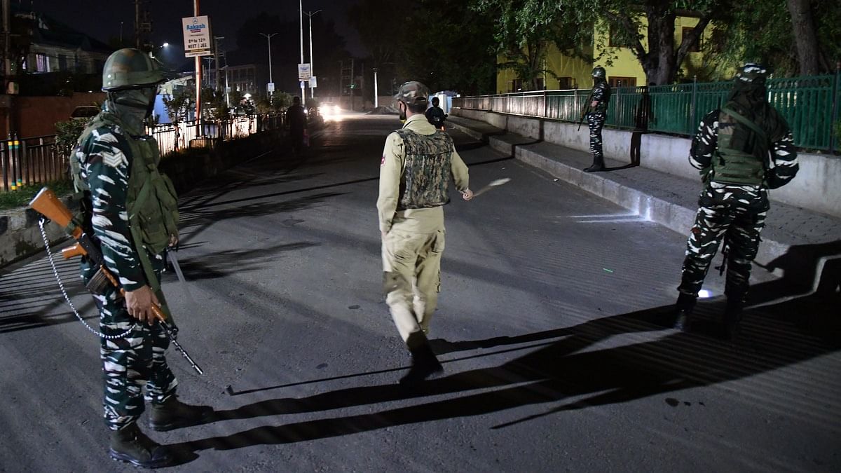 kashmir Security personnel cordon off area after owner of a popular pharmacy in Srinagar, Makhan Lal Bindroo, was shot dead by militants in Srinagar on 5 October 2021. | Photo: ANI