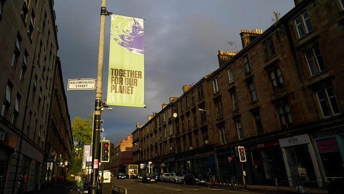 A banner advertising the upcoming COP26 climate talks in Glasgow, UK, on 20 October 2021