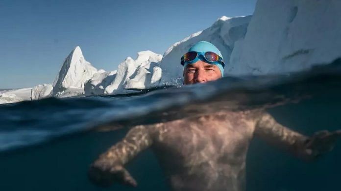 Lewis Pugh swims in the freezing waters of the Arctic