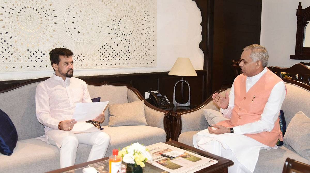 Union Minister for Information & Broadcasting, Youth Affairs and Sports, Shri Anurag Singh Thakur with the Governor of Gujarat, Shri Acharya Devvra. | PIB Photo