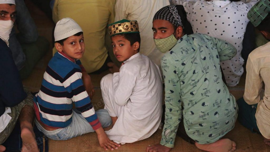 Inside the basement of a school in Sector 12, Muslims offer namaz | Photo: Manisha Mondal | ThePrint