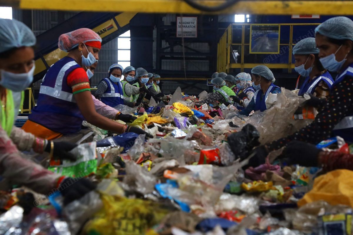 Women employees segregate the garbage at the dumping yard | Photo: Manisha Mondal | ThePrint