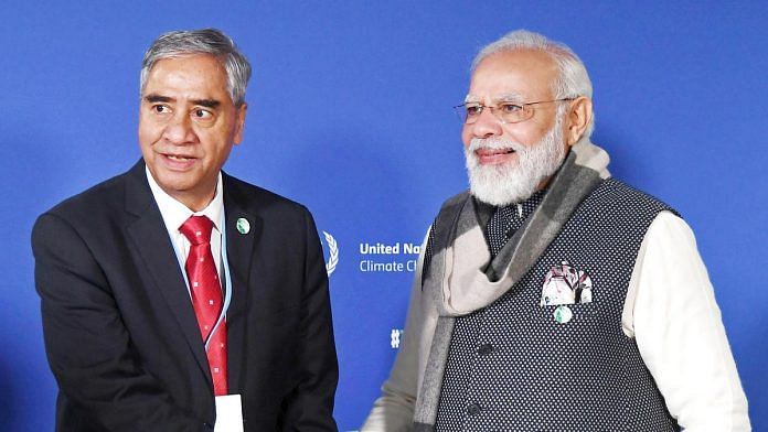 Nepal Prime Minister Sher Bahadur Deuba (left) and Indian PM Narendra Modi meet on the sidelines of the COP26 summit in Glasgow Tuesday | Photo: ANI