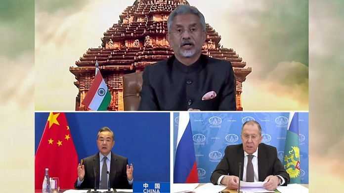 External Affairs Minister S. Jaishankar with Chinese counterpart Wang Yi and Russian Foreign Minister Sergey Lavrov at the 18th virtual meeting of the Russia-India-China framework, on 26 November 2021 | ANI photo