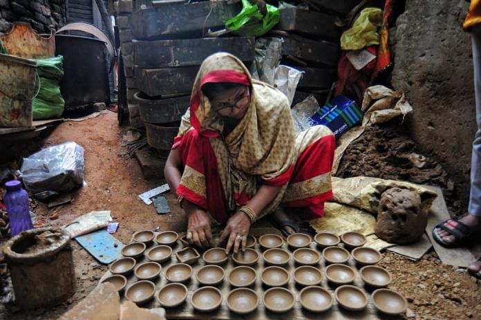 Diyas being made at Delhi's Chandni Chowk market on 2 November, 2021 | Suraj Singh Bisht, ThePrint