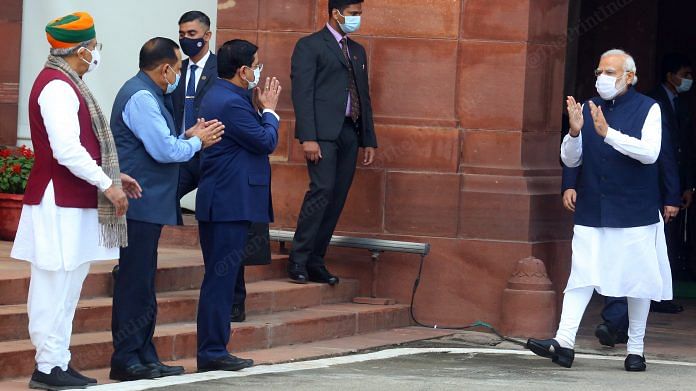 Prime Minister Narendra Modi welcomed by Minister of State for Parliamentary Affairs Pralhad Joshi, Jitendra Singh and Arjun Ram Meghwal before interacting with media at Parliament House | Photo: Praveen Jain | ThePrint