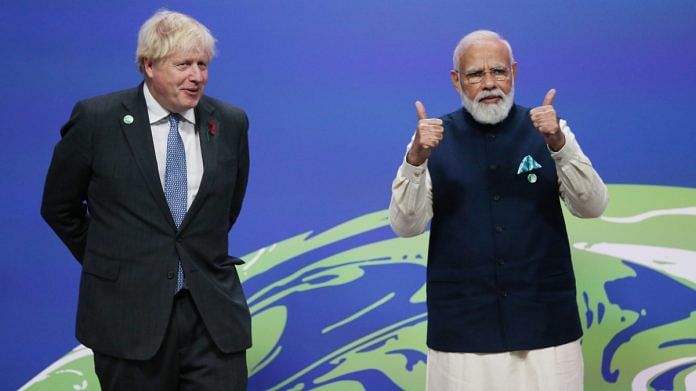 UK-India partnership: PM Boris Johnson and Narendra Modi during the COP26 climate talks in Glasgow on 1 November 2021 | Photographer: Robert Perry/EPA/Bloomberg