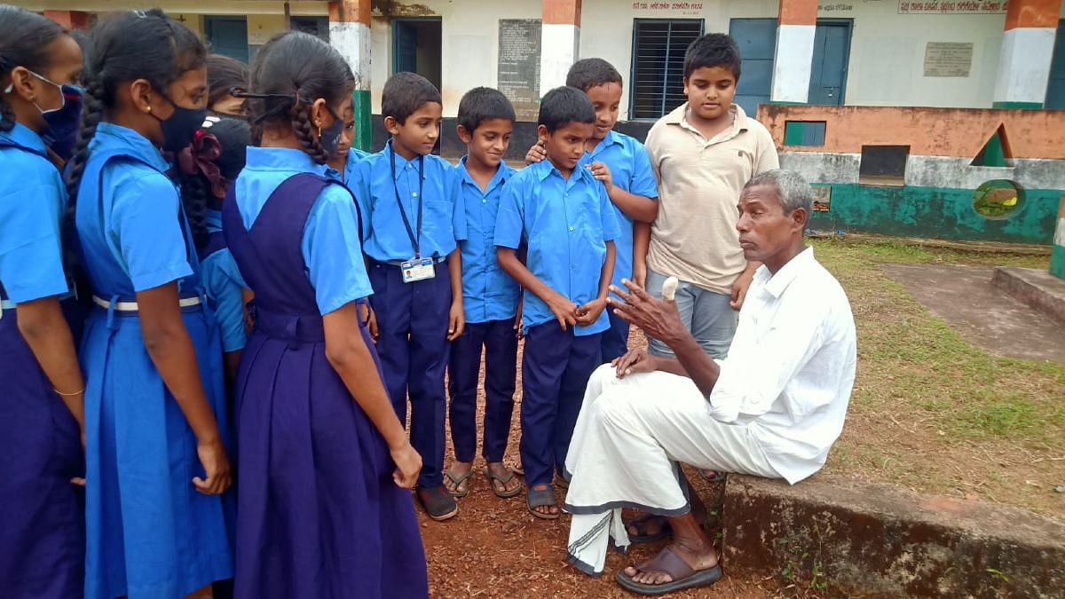 Harekala Hajabba with students of the Government Higher Secondary School in Newpadu, Mangaluru | Anusha Ravi Sood | ThePrint