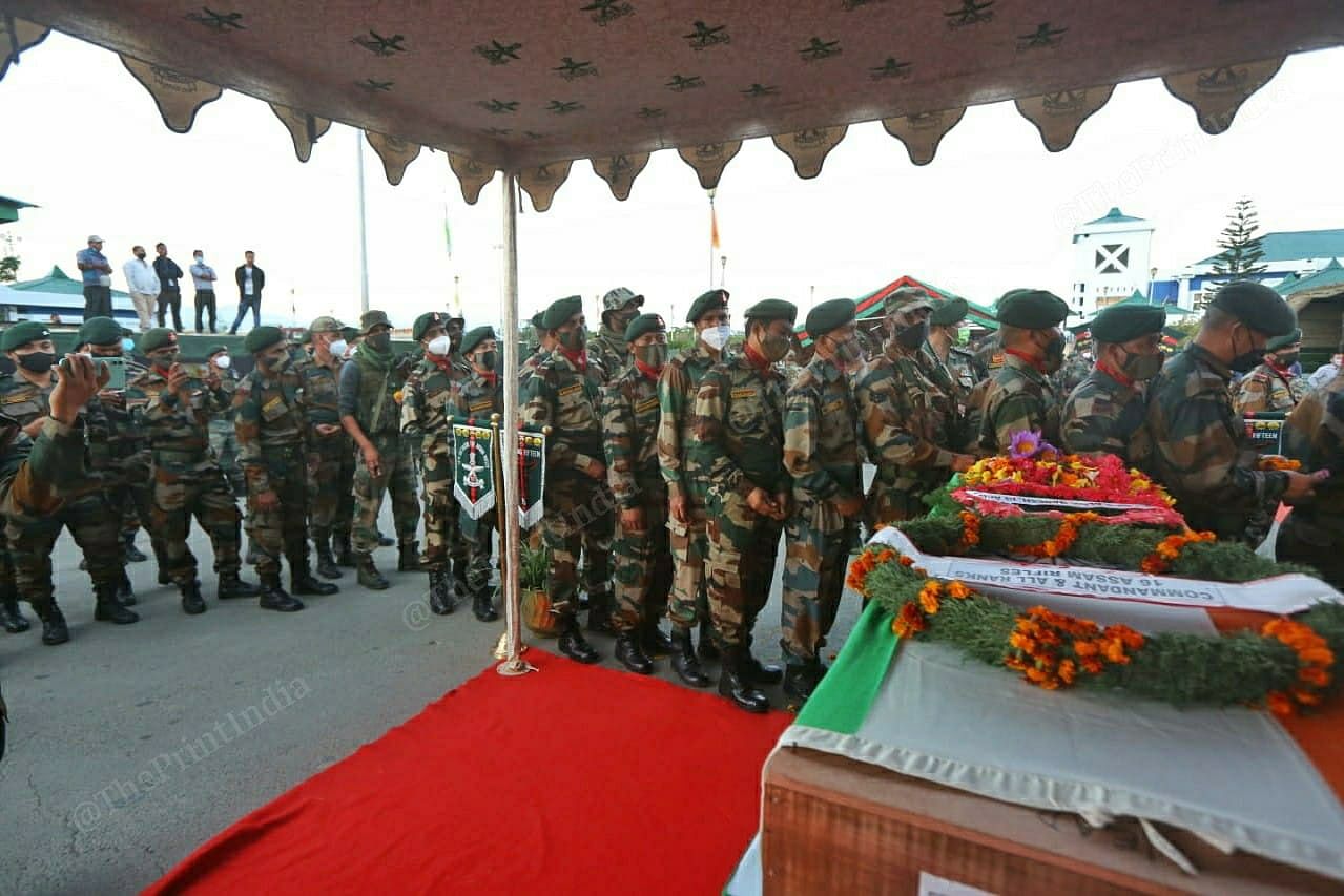 Jawans pay their respects at the wreath laying ceremony at Imphal Airport | Photo: Praveen Jain | ThePrint