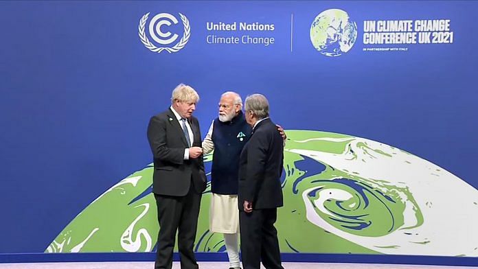 Prime Minister Narendra Modi being received by the UK Prime Minister Boris Johnson and the UN Secretary General Antonio Guterres at the Scottish Exhibition Centre to attend the World Leaders Summit of COP26, in Glasgow, Scotland on 1 November 2021