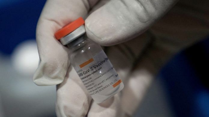 A healthcare worker holds a vial of the Sinovac Biotech Covid-19 vaccine in Jakarta, Indonesia | Representational image | Bloomberg
