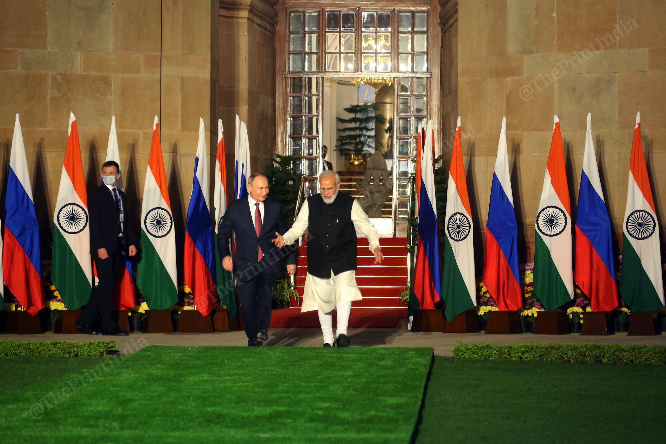 Modi and Putin engaged in conversation| Photo: Praveen Jain | ThePrint