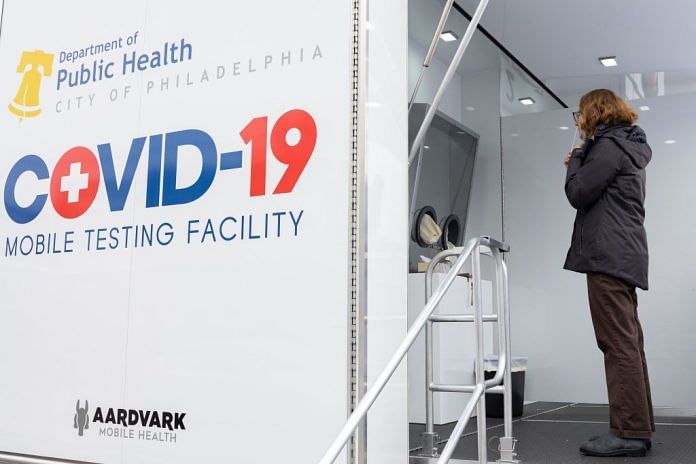 A resident takes a Covid test at a mobile testing site in Philadelphia, US, on 8 December 2021 | Representational image | Bloomberg