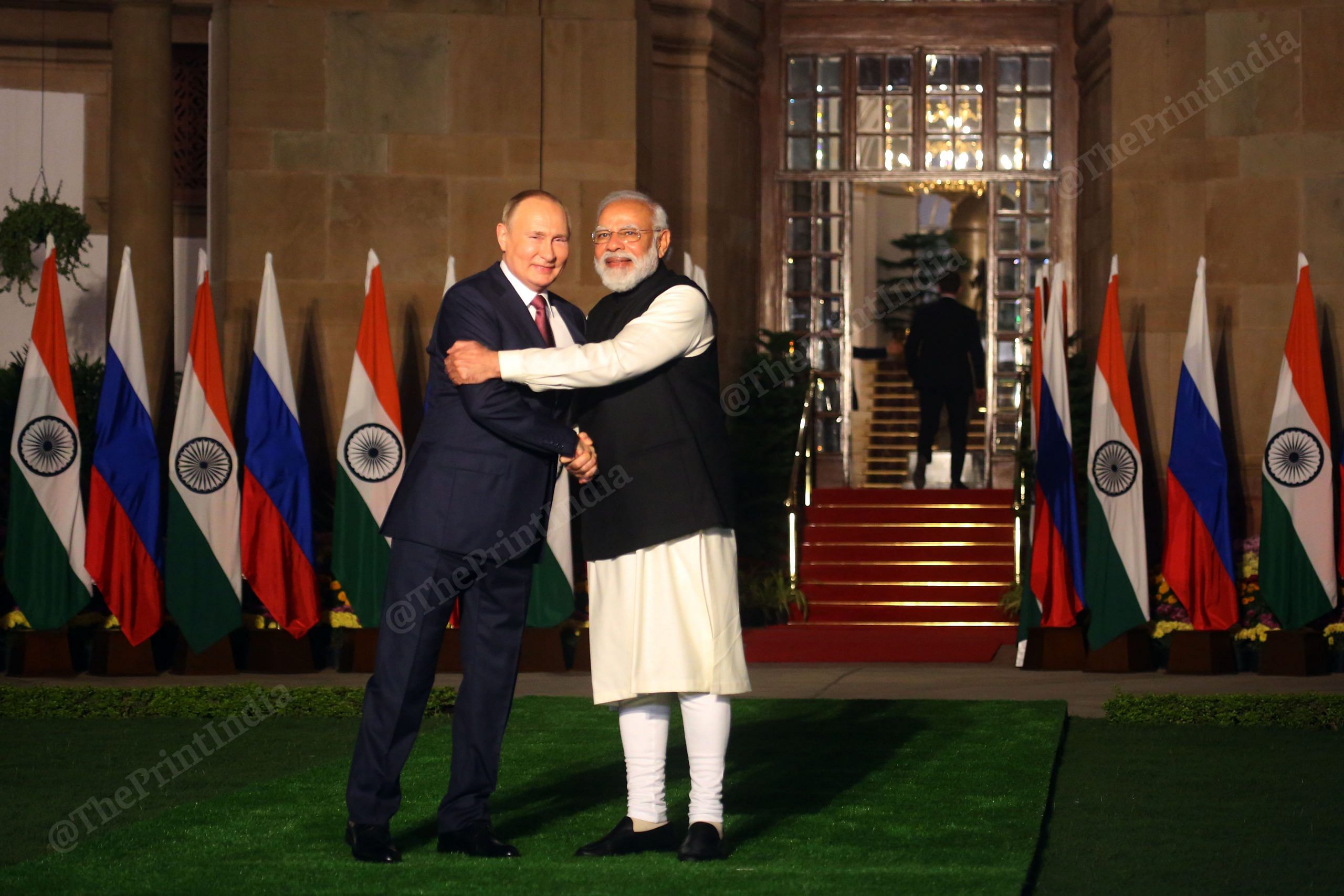  Prime Minister Narendra Modi hug Russian President Vladimir Putin before a meeting at Hyderabad House| Photo: Praveen Jain | ThePrint