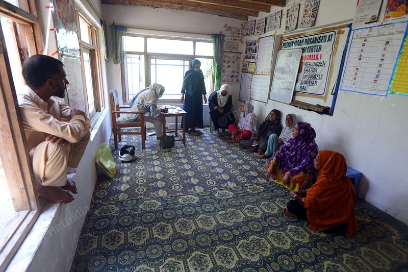 A medical team, including Asha workers, at a vaccination centre in Srinagar’s Abidal | Photo: Praveen Jain | ThePrint