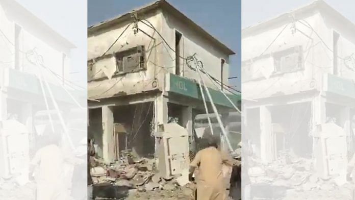 Debris near a building after a blast in Karachi, on 18 December 2021