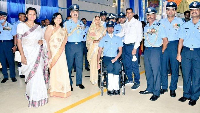 Flying Officer Yogesh Yadav with IAF chief Air Chief Marshal V.R. Chaudhari (third from left) and his family | By Special Arrangement