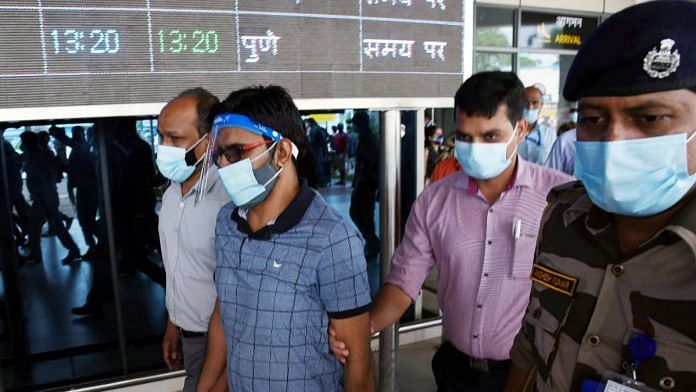 An NIA team arrives with one of the accused in the Darbhanga blast case at Patna airport on 3 July | ANI