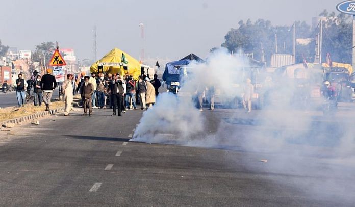 Delhi Police fire tear gas shells at protesting farmers as they try to cross the border on 27 November 2020 | PTI