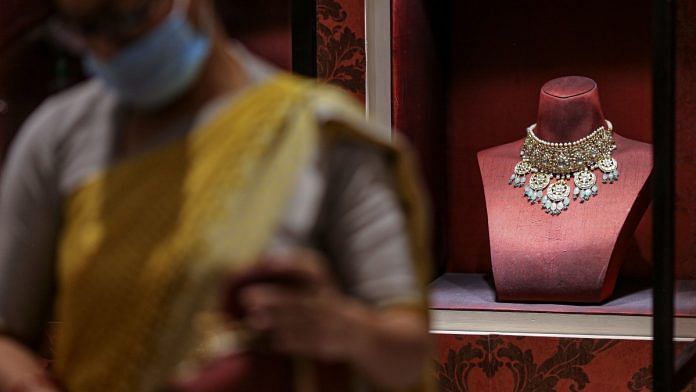 A gold necklace displayed inside a Titan Co. Tanishq jewelry store during the festival of Dhanteras in Mumbai | Representational image | Bloomberg