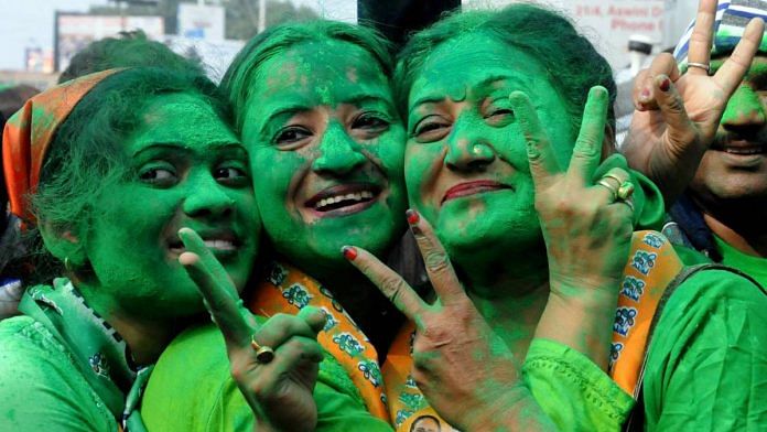 Victorious Trinamool Congress candidate Kajari Banerjee (right) celebrates with supporters in Kolkata on 21 December. | ANI