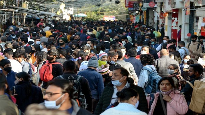 People throng Sarojini Nagar market flouting social distancing norms amid rising cases of the new Covid-19 variant Omicron, despite implementation of Level-I (yellow alert) of the Graded Response Action Plan (GRAP), in New Delhi | File photo: ANI
