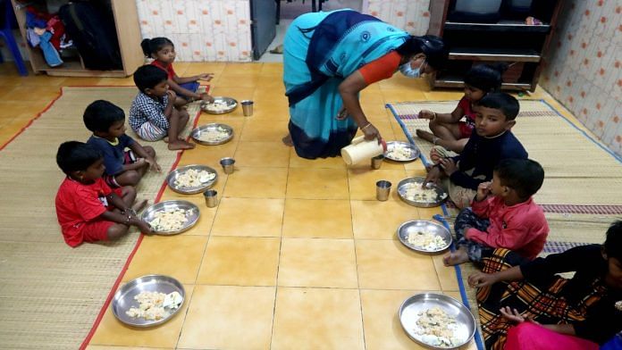 Children having mid day meal at an anganwadi school | Representational photo: ANI