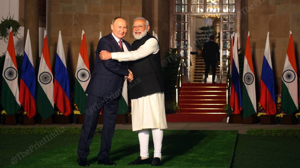 modi-putin-hug Prime Minister Narendra Modi greets Russian President Vladimir Putin before a meeting at Hyderabad House on 6 December. `| Photo: Praveen Jain | ThePrint