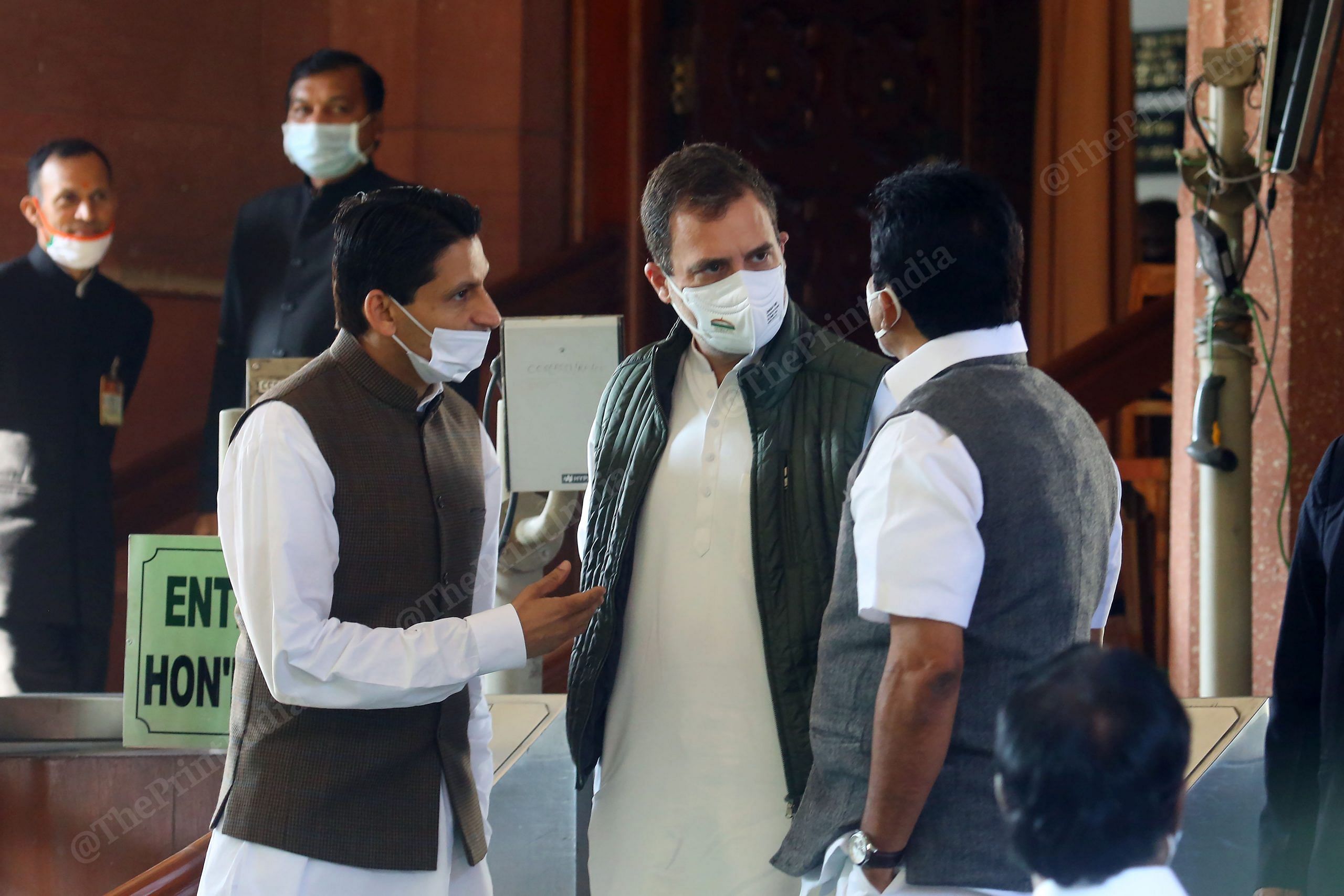 Congress leader Rahul Gandhi, with party members Deepender Singh Hooda and K. C. Venugopal outside Parliament House | Photo: Praveen Jain | ThePrint