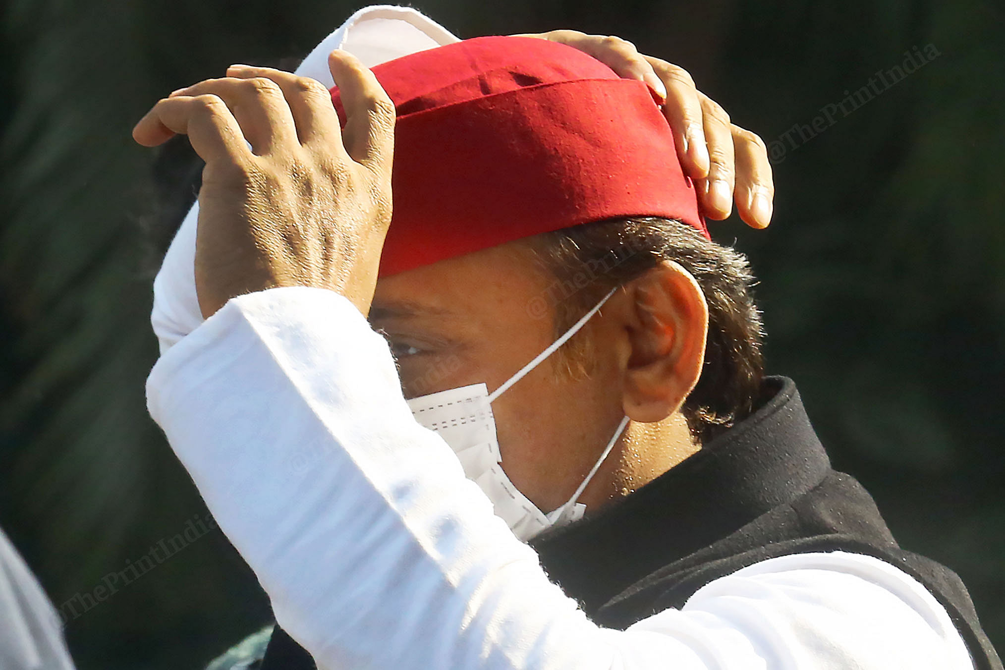 Akhilesh Yadav's cap drew attention because of the PM's comments Tuesday, on those in red caps, a reference to the SP | Photo: Praveen Jain | ThePrint
