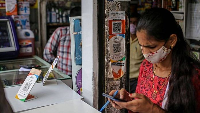A medical store advertises the use of the Google Pay and Amazon Pay digital payment systems in Mumbai | Bloomberg Photo