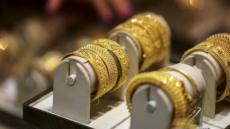 Gold holds biggest decline in six weeks as bond yields surge