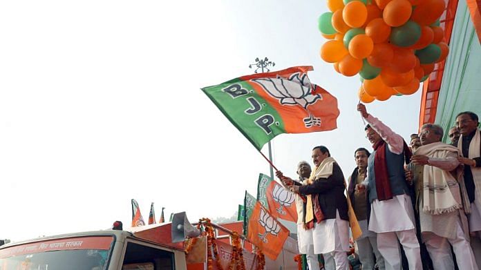 BJP chief JP Nadda along with Uttarakhand CM Pushkar Singh Dhami flags off Vijay Sankalp Yatra in Haridwar on 18 December 2021 | ANI File Photo