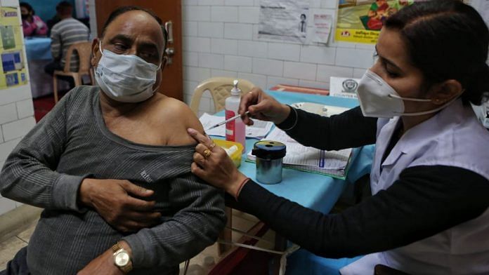 A senior citizen gets the third dose of a Covid vaccine in Delhi | Photo: Suraj Singh Bisht | ThePrint