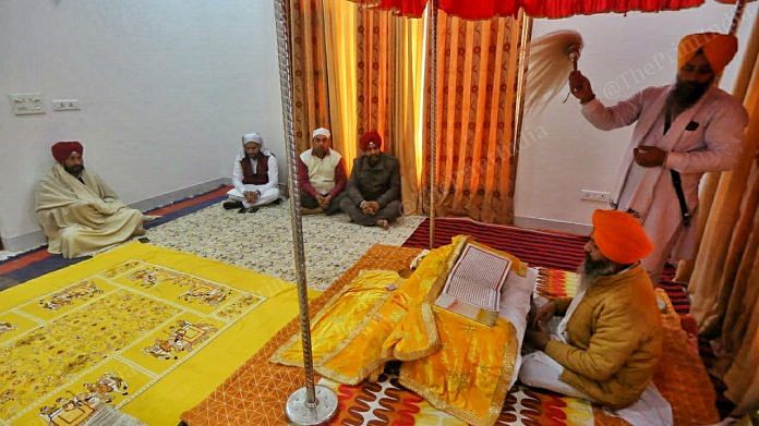 Punjab Chief Minister Charanjit Singh Channi listens to a recitation from the Guru Granth Sahib, at his residence in Morinda | Praveen Jain | ThePrint