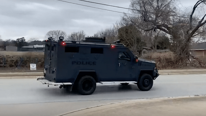 A police swat team responds to the hostage situation in Colleyville, Texas, on 15 January. | Bloomberg