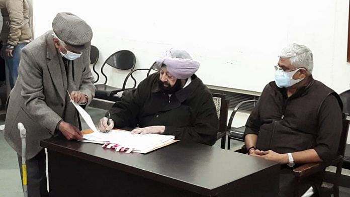 Punjab Lok Congress chief Amarinder Singh in presence of Union minister Gajendra Singh Shekhawat files his nomination for Patiala Urban seat, on 31 January 2022 | ANI Photo