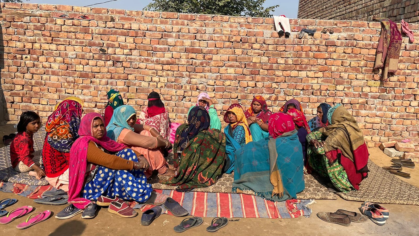 A group of women in Baganwala village with Binder's wodow Pooja (in black & red dupatta) | Photo: Ishadrita Lahiri | ThePrint