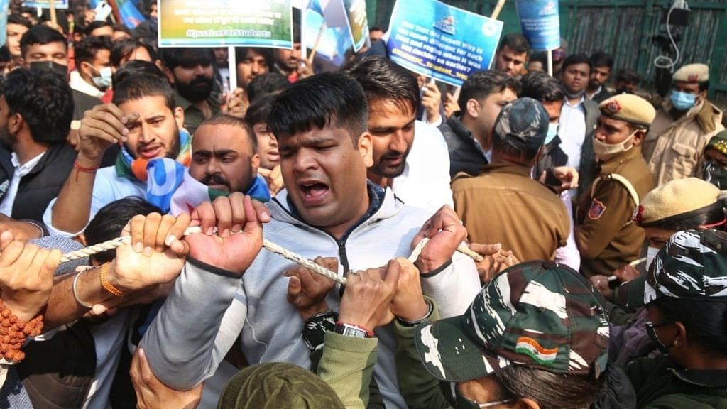 NSUI activists during a protest in support of the demands of students of NTPC, among others, and against the alleged police brutality against the agitating students, in New Delhi on Thursday. | Photo: Suraj Singh Bisht/ThePrint