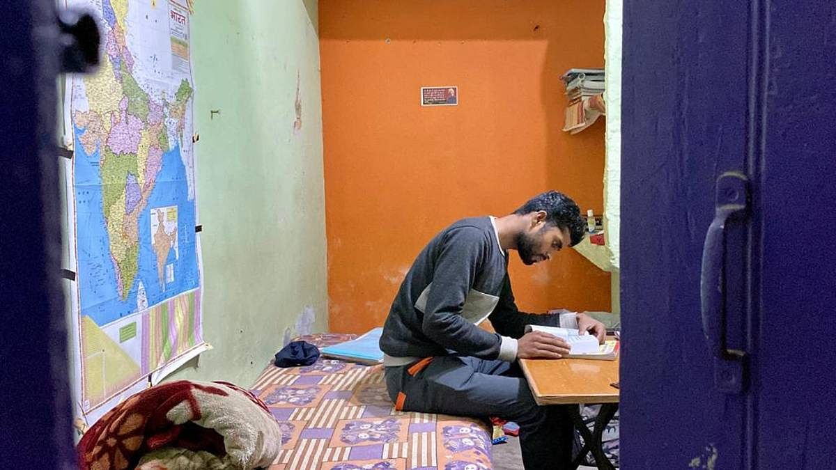 Rakesh Kumar studies in his room in Patna. | Photo: Nirmal Poddar | ThePrint