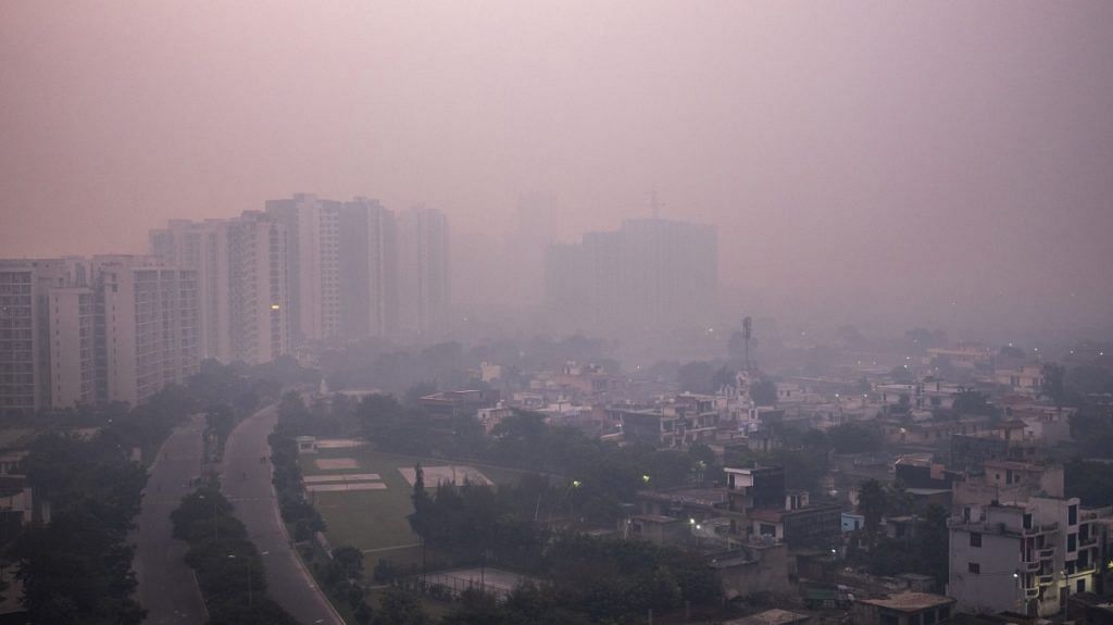 Buildings are shrouded in smog in Noida | Representational image | Bloomberg