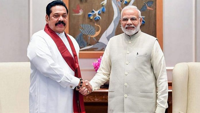 File photo | Prime Minister Narendra Modi shakes hands with Mahinda Rajapaksa, in New Delhi | PTI