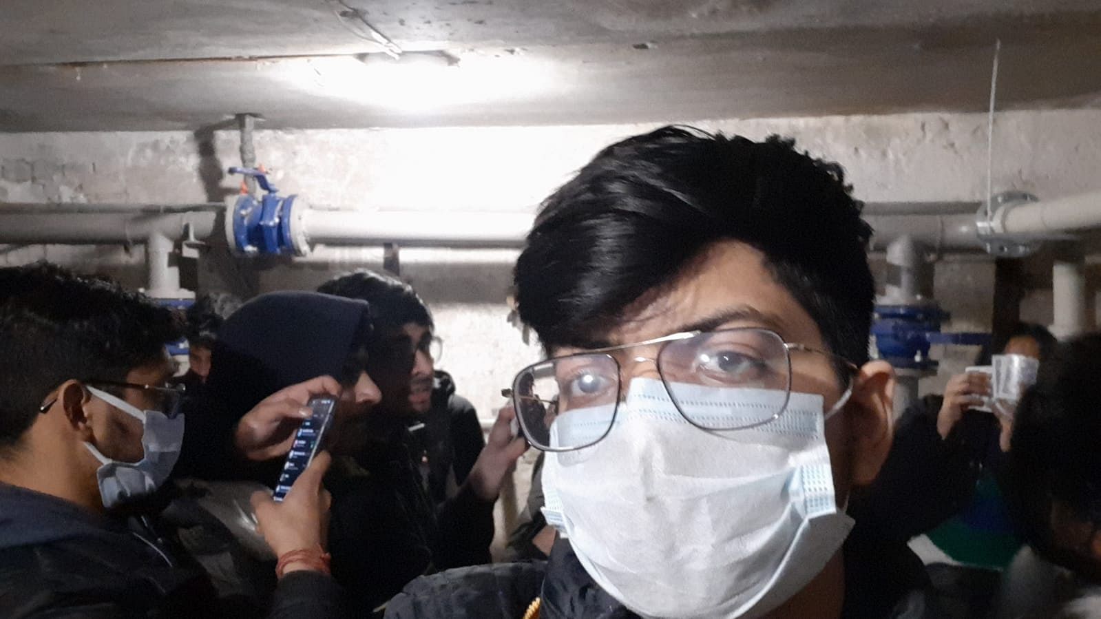 Aditya Singh, 17, takes a selfie alongside other Indian students in an underground bunker in Ukraine’s Kharkiv Saturday. Around 50 students are taking shelter in each bunker. | Aditya Singh | By special arrangement