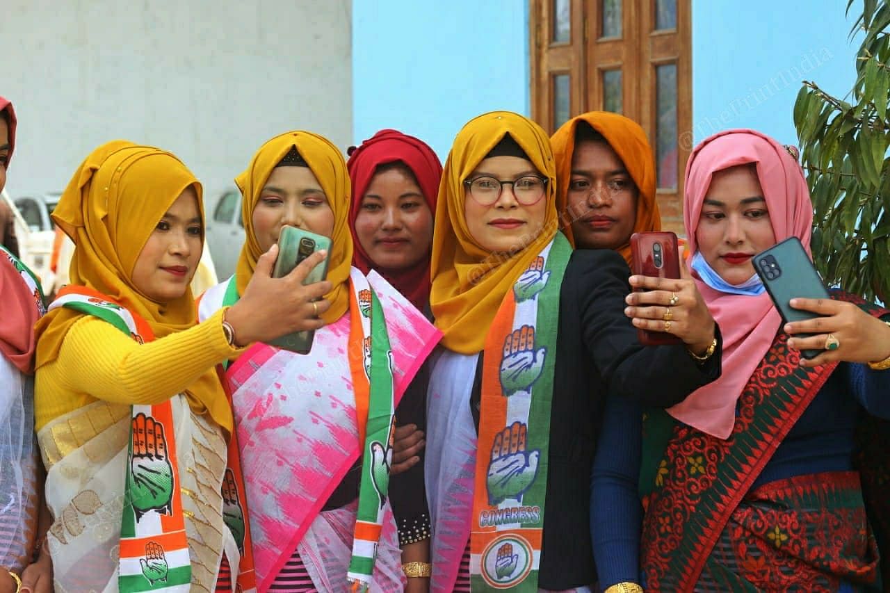 Women in hijab take selfie at a Congress rally | Photo: Praveen Jain | ThePrint