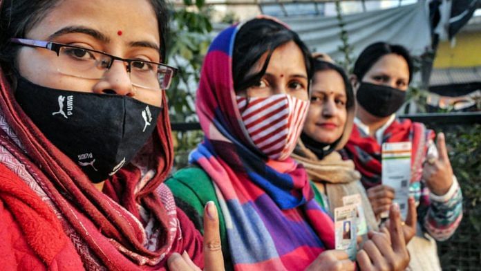 Women voters during the second phase of Uttar Pradesh assembly elections, in Moradabad, 14 Feb 2022 | PTI