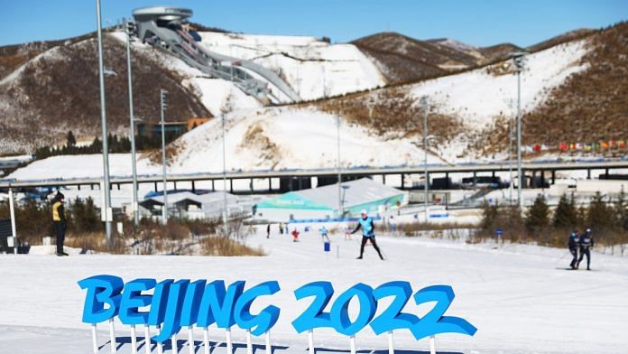 A Beijing 2020 logo is seen on the Cross-Country course ahead of Winter Olympic Games in Beijing, on 1 February 2022 | Photo by Clive Rose/Getty Images via Bloomberg
