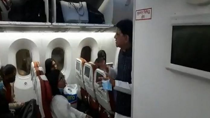 Union Commerce Minister Piyush Goyal speaks to Indian students who returned from Ukraine aboard an Air India aircraft soon after it landed Saturday | Twitter/ @PiyushGoyal
