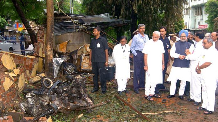 Then Prime Minister Manmohan Singh and Gujarat CM Narendra Modi visits bomb blast site at Mani Nagar in Ahmadabad, on 28 July 2008 | File Photo | Commons
