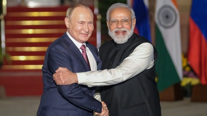 File photo of Prime Minister Narendra Modi with Russian President Vladimir Putin | Bloomberg